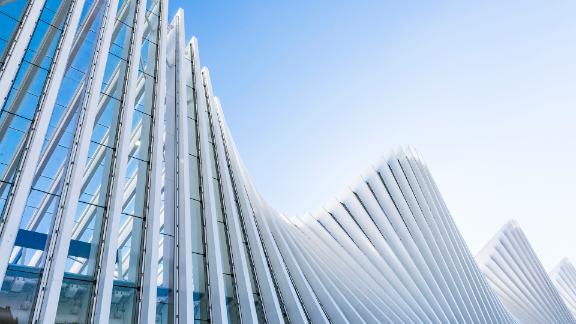 Abstract White Architecture Building on Clear Blue Sky