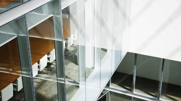 Glass walls in atrium of office building
