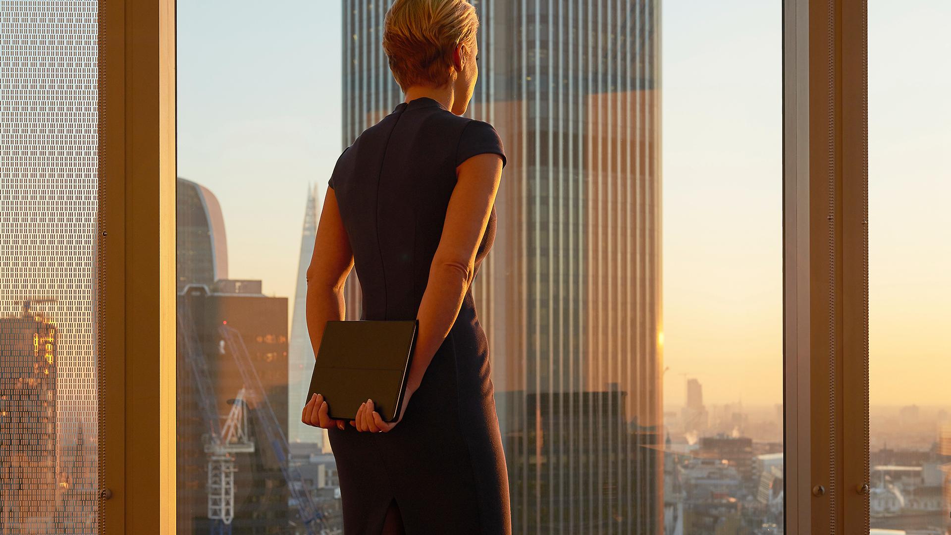 Businesswoman looking to the future - stock photo