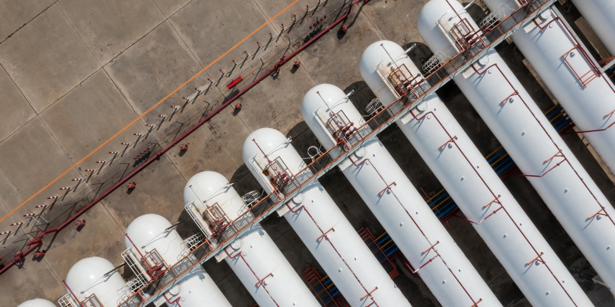 White Oil Tanks Lined Up in a Row